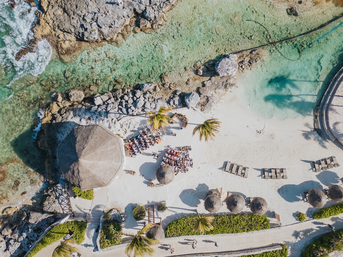 Aerial view of wedding ceremony on a private beach at Hard Rock Riviera Maya