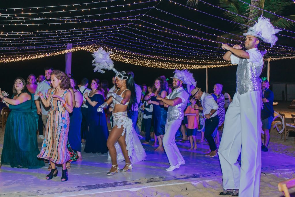  Wedding guests joining in on “la hora loca” entertainment
