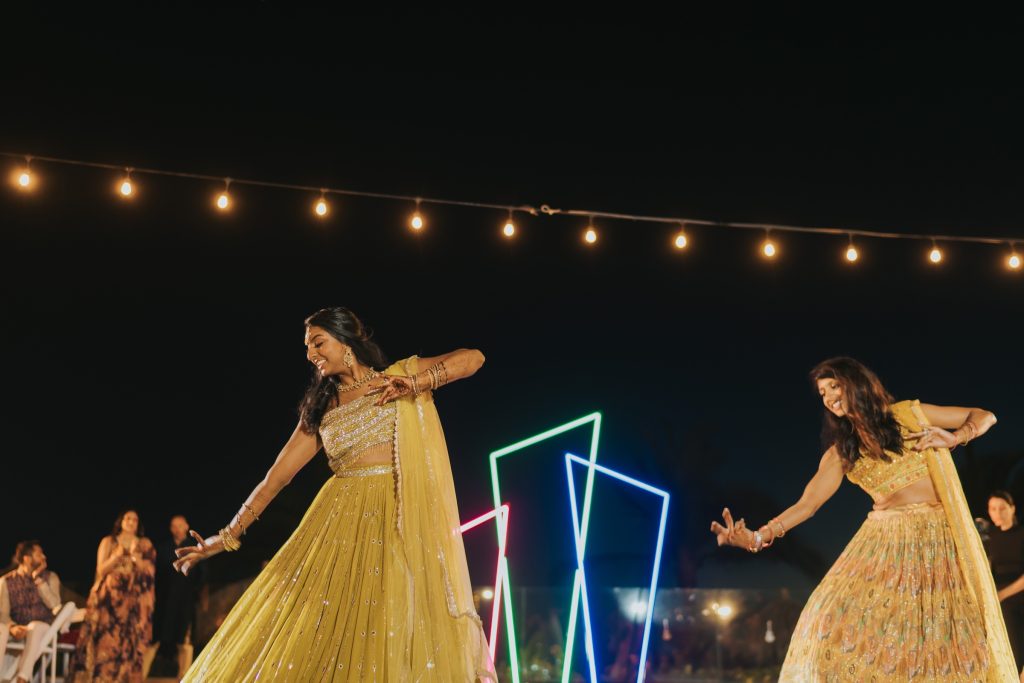 Bride participates in the and Sangeet celebration. 